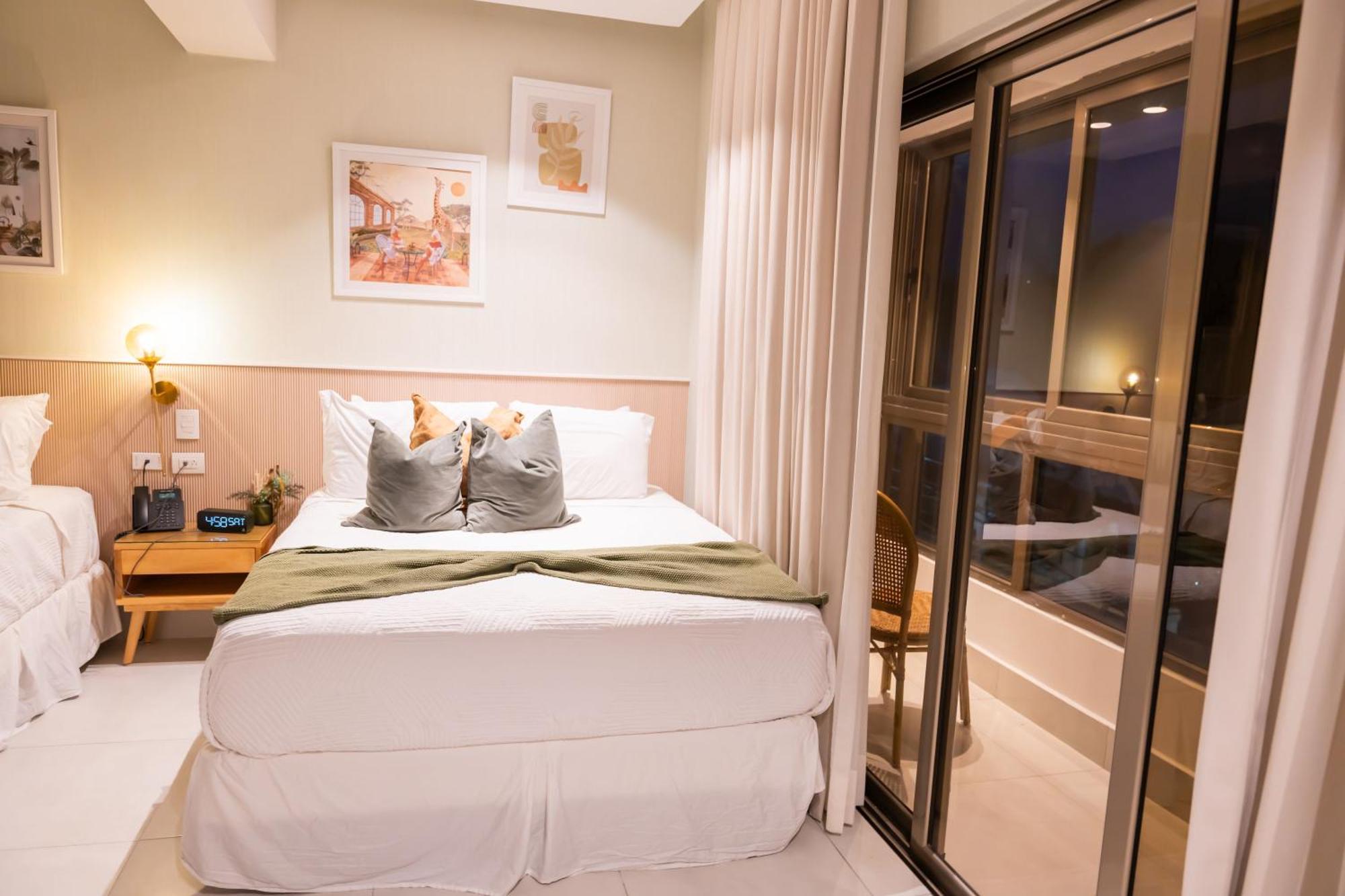 Hotel Stay Here Suites Santo Domingo Exterior photo