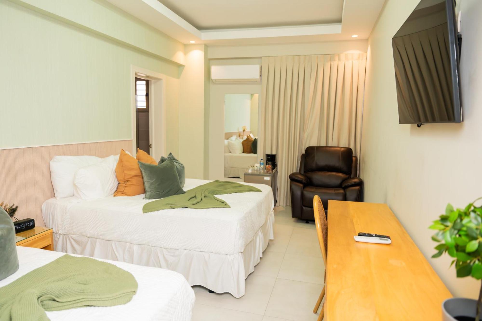 Hotel Stay Here Suites Santo Domingo Exterior photo